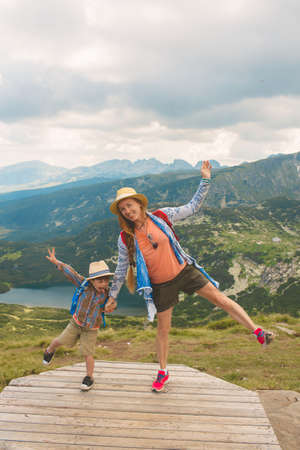 Family traveling in Rila mountains Bulgariaの写真素材
