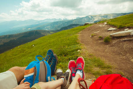 Legs of traveler familyの写真素材