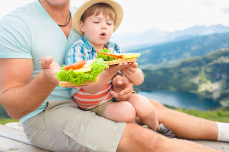 Family on a picnic in the mountainsの写真素材