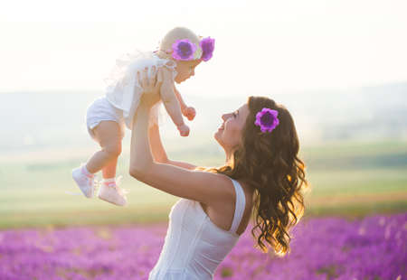Mom and her daughter in a lavender field
