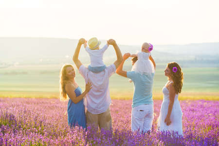 Two friendly family in a lavender field