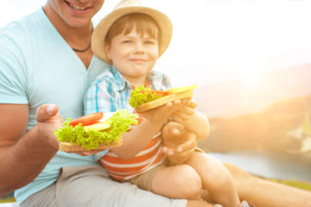Family on a picnic in the mountainsの写真素材