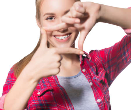 Portrait of teen girl showing dental braces.の写真素材