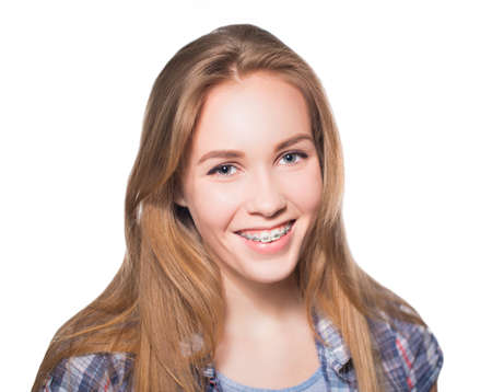 Portrait of teen girl showing dental braces.の写真素材