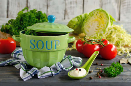 Shchi - traditional russian cabbage soup on a wooden table. Style rustic. Selective focusの写真素材