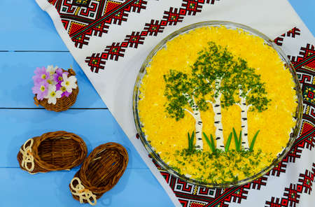 Salad with composition in the form of birch on the tableの写真素材