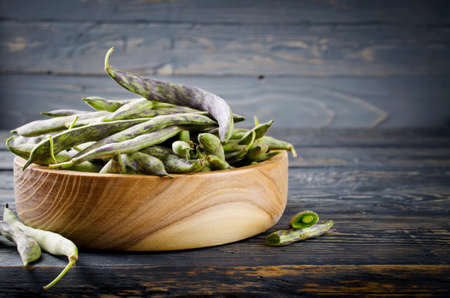 Green fresh soybeans on wood background. Selective focusの写真素材