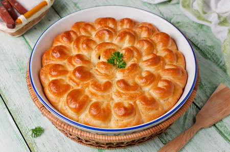 Homemade pie with meat cooked in the shape of a flowerの写真素材