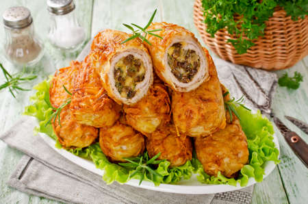 Crisp potato cutlets with meat, mushrooms and cheese. Traditional Russian food Zrazy