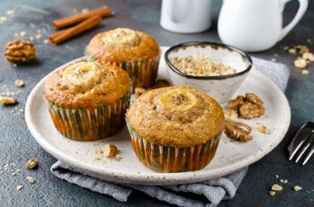 Banana muffins with cinnamon and walnuts. Fresh homemade pastryの写真素材