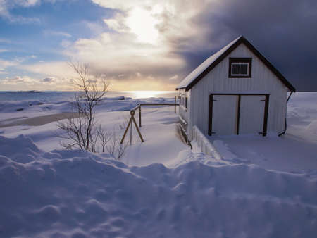Small white barn in the village of A on Lofoten, Norwayの写真素材