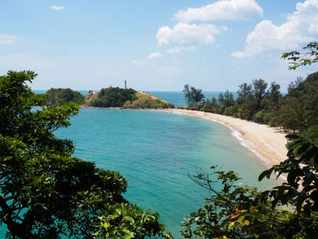 Lighthouse and beach in Ko Lanta National Park from aboveの写真素材