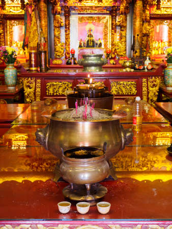 Offerings in a Chinese temple in Georgetown, Penang, Malaysia