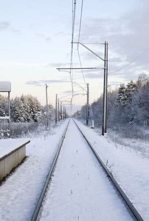 winter time railway in forestの写真素材