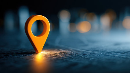 Orange map pointer on a dark background. Place for your text.の素材