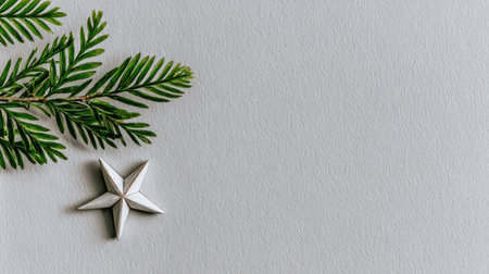 Christmas background with fir branches and star on a white background. Flat lay, top view.の素材