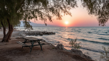 Wooden bench on the beach at sunset, Crete, Greeceの素材