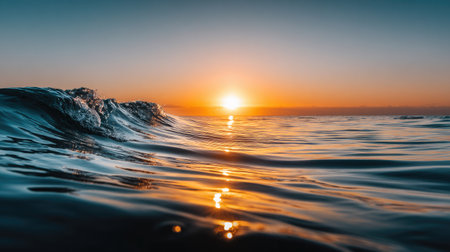 Beautiful sunset on the sea. The waves are reflected in the water.の素材