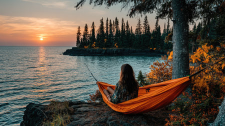 Woman relaxing in hammock on the coast of lake Baikalの素材