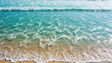 Soft wave of the sea on the sandy beach. Summer background.の素材
