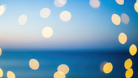 Bokeh of sea and blue sky with sun light abstract background.の素材