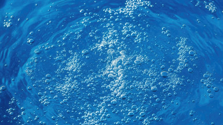 Blue water with air bubbles, close-up. Abstract background.の素材