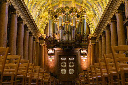 Inside the Rennes cathedral, Cathedral Saint Pierre, looking down the rows to the main organのeditorial素材