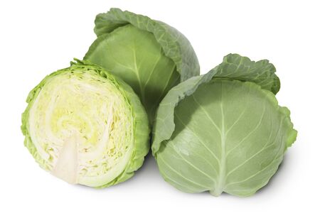 Group of green heads of white cabbage with sliced one isolated on a white backgroundの写真素材