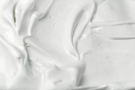 White meringue cream texture. Whipped white egg texture. Latte foam. Whipping cream.の写真素材