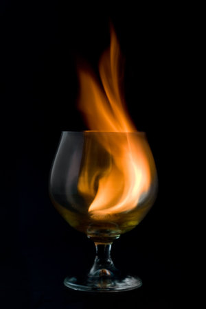 fire tongue inside glass, on black background