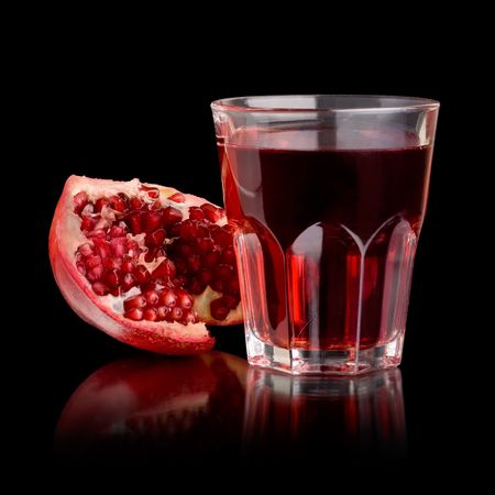 fresh half of pomegranate and juiceの写真素材