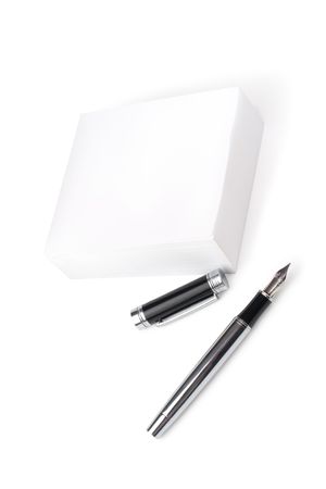 Close up noutbook and pen on it isolated over whiteの写真素材