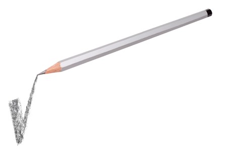pencils writing on white paperの写真素材