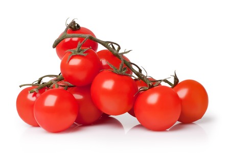 bunch of fresh cherry tomato on white background の写真素材