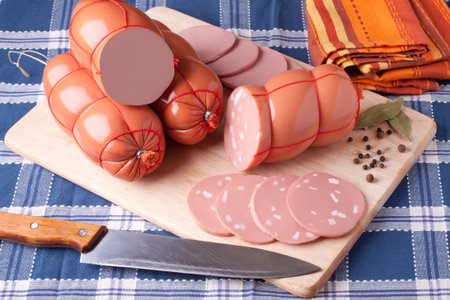 boiled sausage, on a wooden cutting board. の写真素材