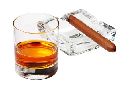 Cigar and whiskey on white backの写真素材