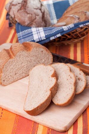 Sliced homemade brown bread.の写真素材