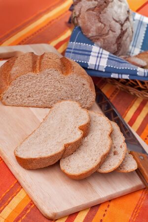 Sliced homemade brown bread.の写真素材