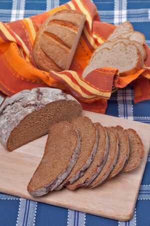 Sliced homemade brown bread.の写真素材
