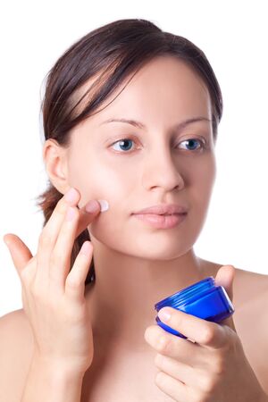 Lotion on the women hand. Isolated on white backgroundの写真素材