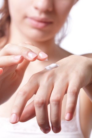 Cream on the women hand.の写真素材
