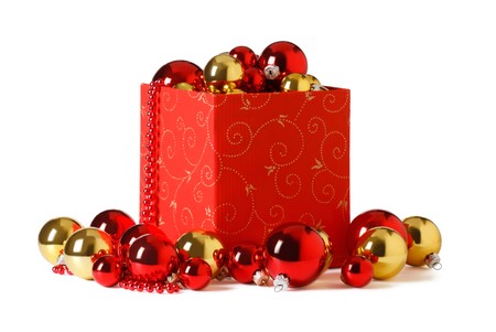 christmas present. Gift box and christmas baubles  on a white backgroundの写真素材