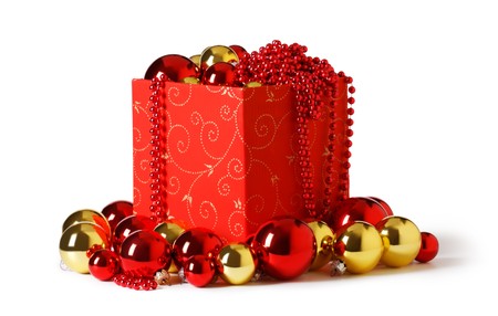 christmas present. Gift box and christmas baubles  on a white backgroundの写真素材