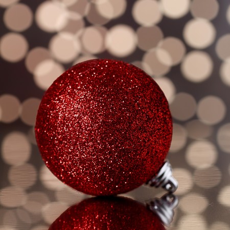 christmas balls on a holiday lights backgroundの写真素材