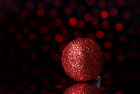 christmas balls on a holiday lights backgroundの写真素材