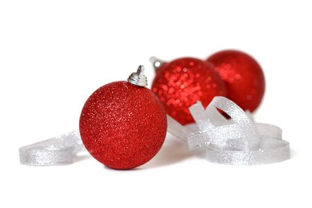 xmas ball and ribbonl on a white backgroundの写真素材