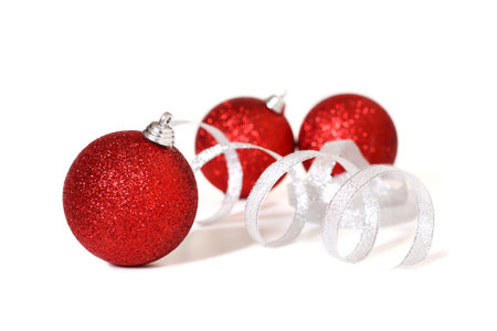 xmas ball and ribbonl on a white backgroundの写真素材