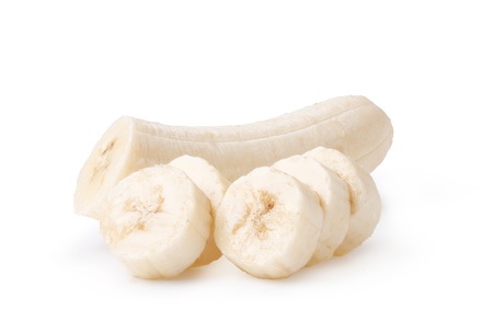 Freshly sliced bananas on a white backgroundの写真素材