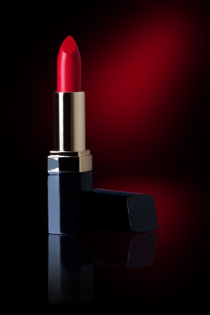 Red lipstick isolated on Black backgroundの写真素材