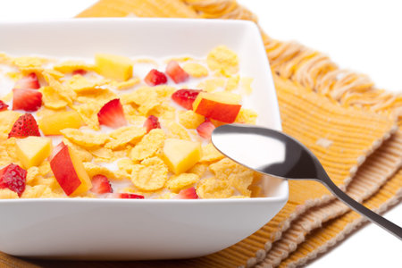 cornflakes with milk and strawberries